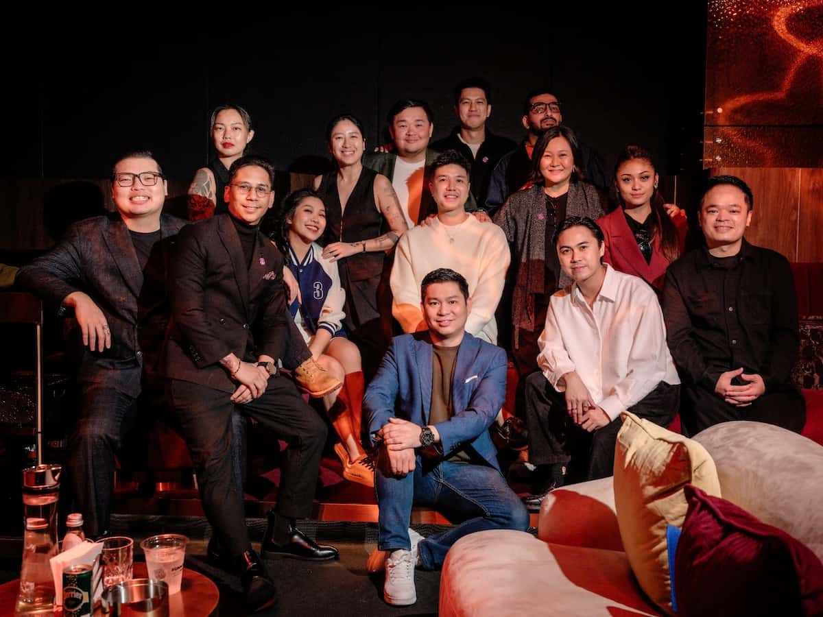 A group of people posing for the camera.