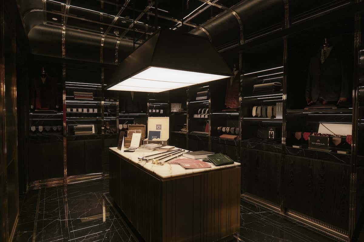 a room with a table and shelves