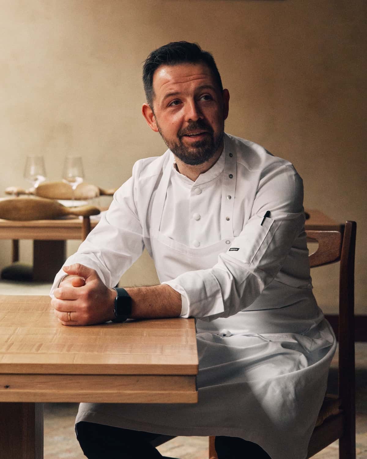 A chef sat at a table.
