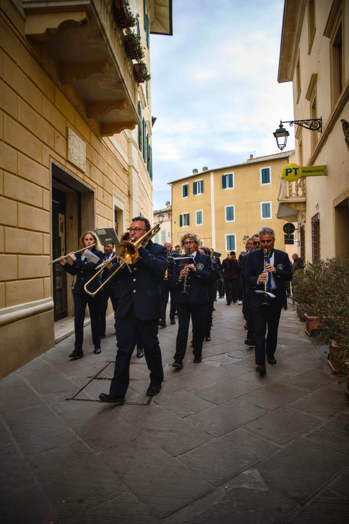 A band in a narrow street.