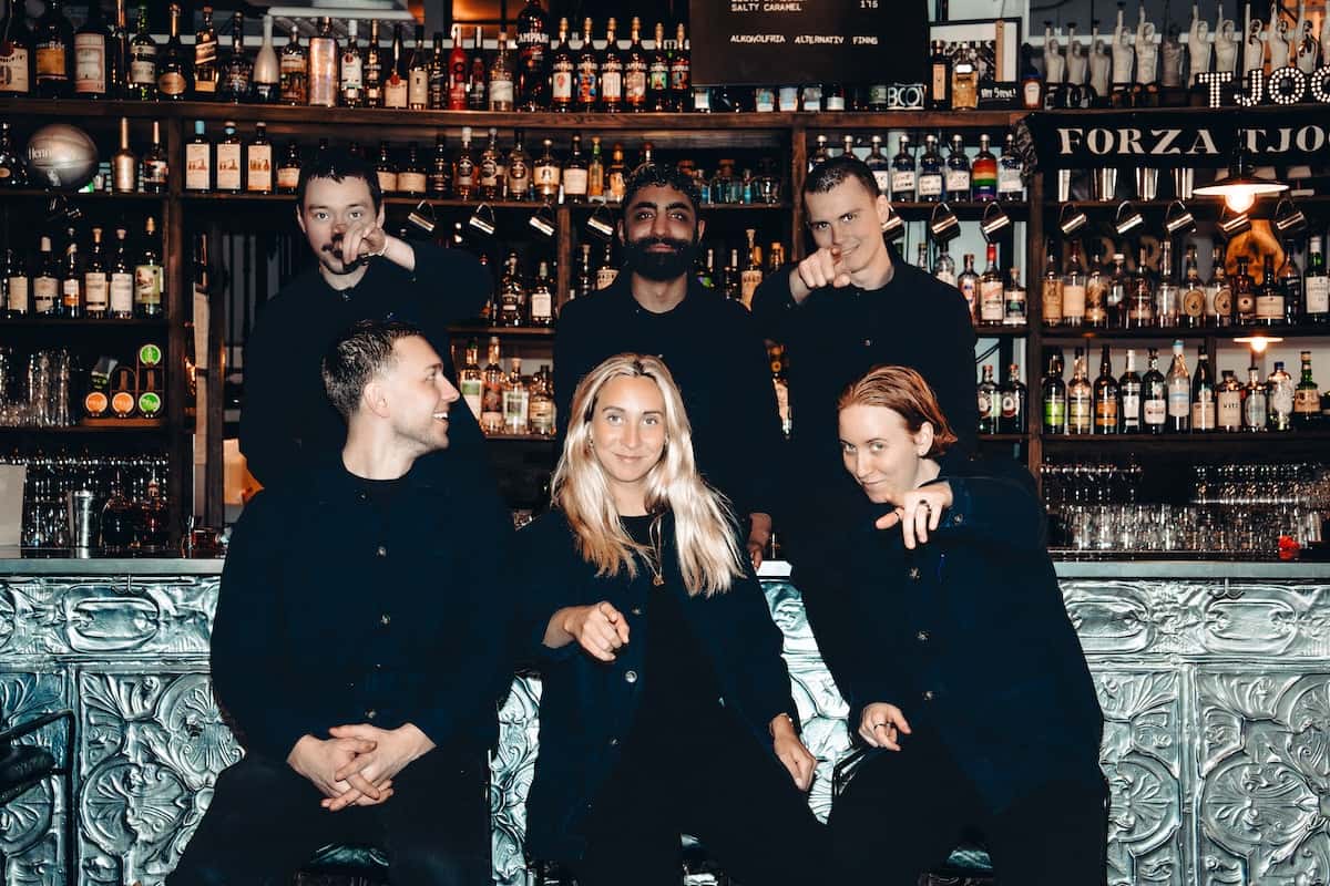 a group of people posing for a photo