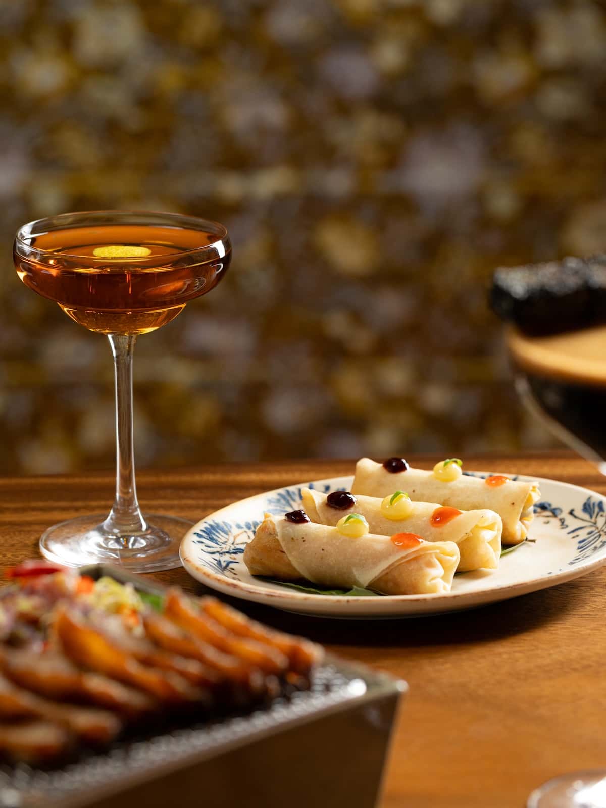 A cocktail and some food.