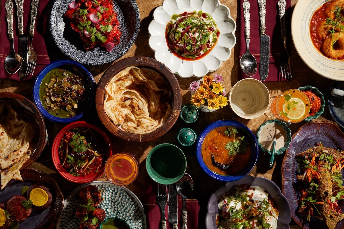 A table full of Indian food.